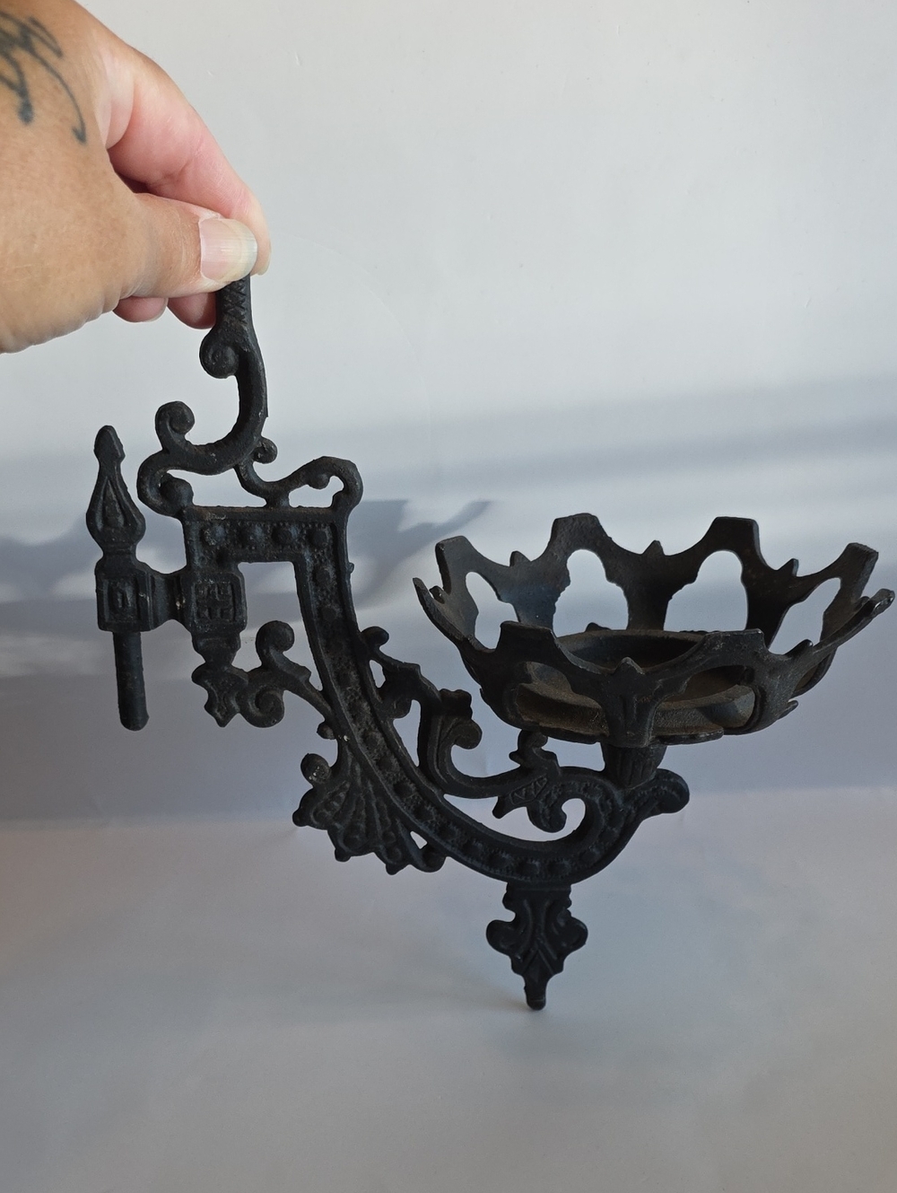 Vintage Cast Iron Oil Lamp Holder featuring an ornate swing-arm bracket